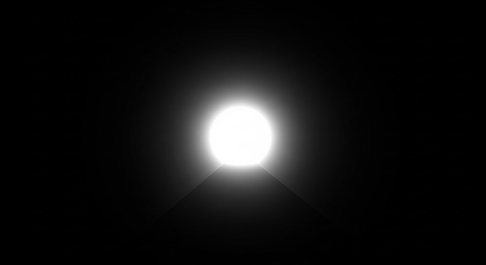 A white spot on a black background