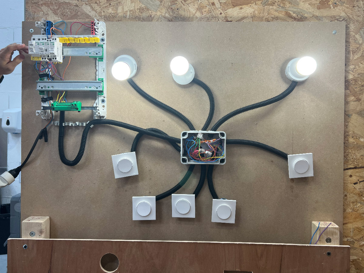 Setting up a (bigger) junction box to centralise the latching and toggle switch circuits, controlled from the same circuit breaker.