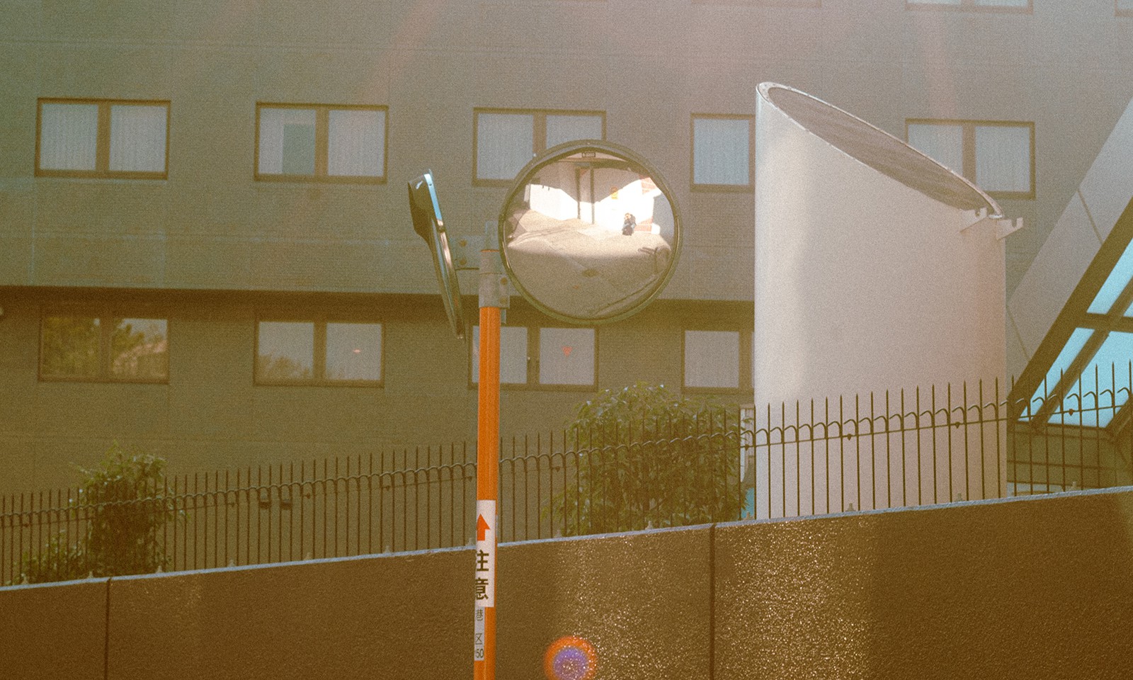 Traffic mirror self-portrait